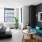 Model studio apartment at Henry Hall in Hudson Yards, featuring wood grain floor paneling and windows with curtains.